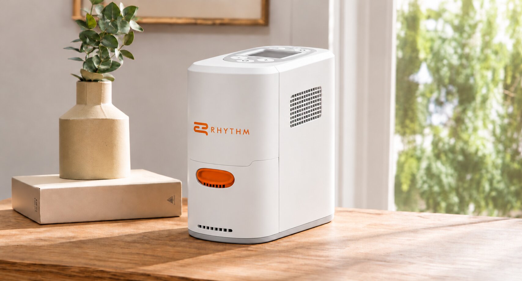 Rhythm P2 portable oxygen unit on a wooden table in a bright living room